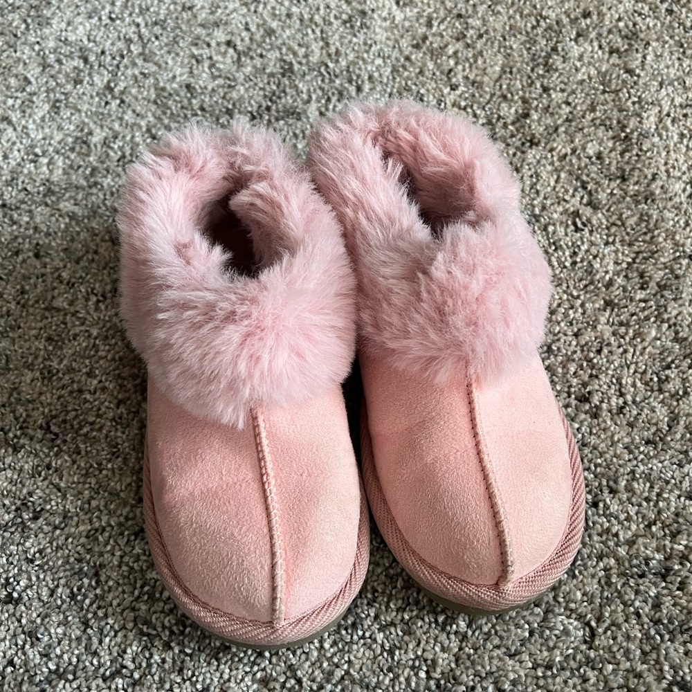 Pink furry slippers with hard sole